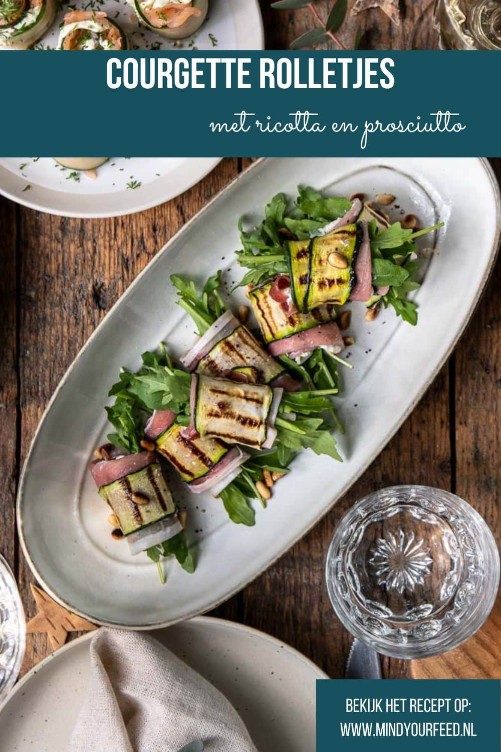 Feestelijk recept voor courgette rolletjes met ricotta, prosciutto, pijnboompitten en rucola; een licht en luxe borrelhapje of voorgerecht dat makkelijk vooraf te maken is.